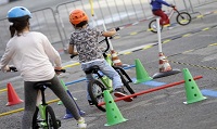 Bambini in bicicletta a Milano